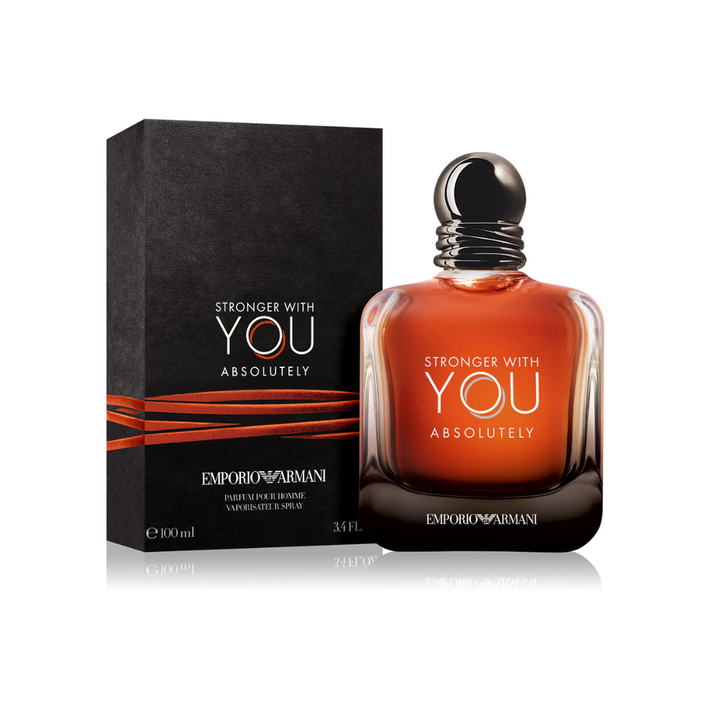Armani Stronger With You Absolutely EDP 100ml bottle beside its elegant packaging, photographed for Fragrance Emporium. Highlights the authentic presentation and captivating aroma of rum, Madagascar vanilla, and caramel — a rich, masculine fougère-ambery fragrance.
