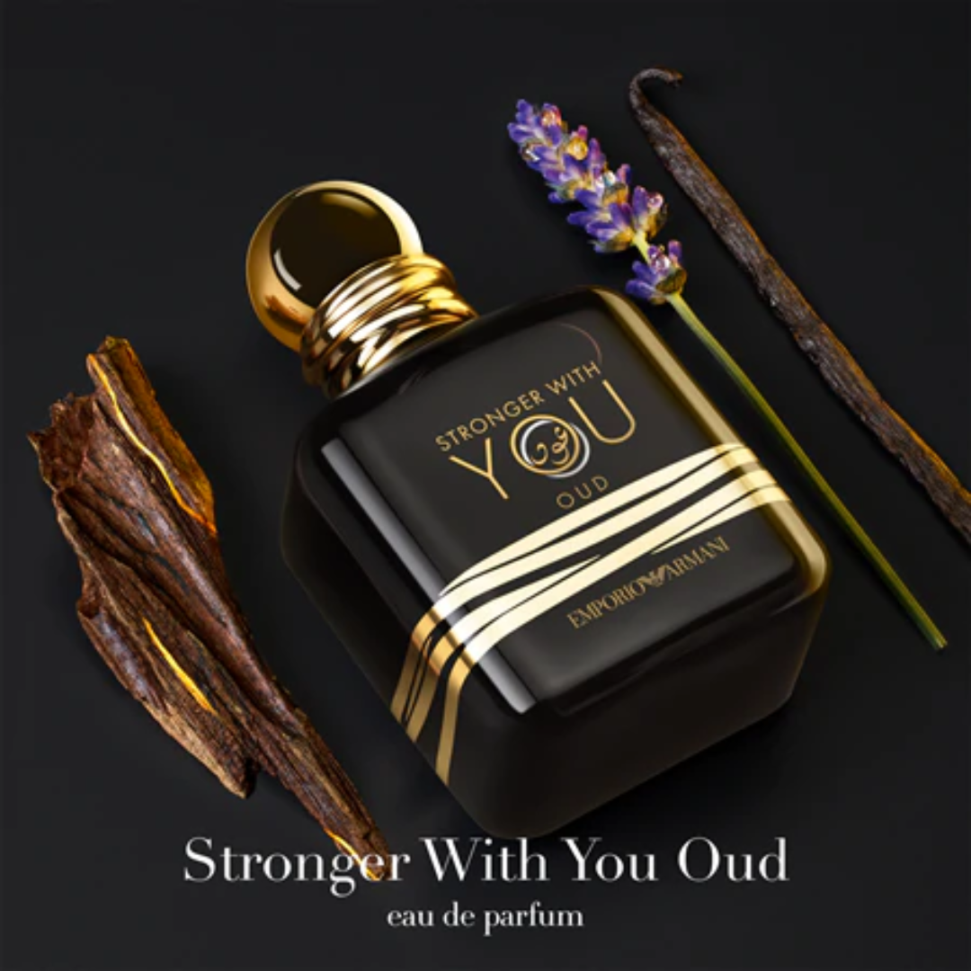 Artistic flat lay of Armani Stronger With You Oud Eau de Parfum 100 ml surrounded by cinnamon sticks, lavender, and vanilla beans, visually representing its spicy, aromatic, and sweet accords. The image conveys the fragrance’s warm depth and sensual elegance, perfect for luxury perfume lovers.