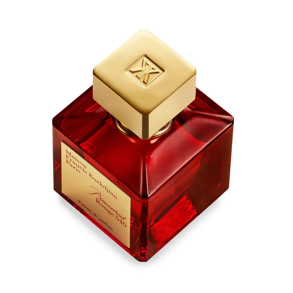 Maison Francis Kurkdjian Baccarat Rouge 540 Extrait 70 ml bottle and box in red and gold design. A rich unisex perfume blending saffron, jasmine, cedar, and ambergris. Sold by Fragrance Emporium.
