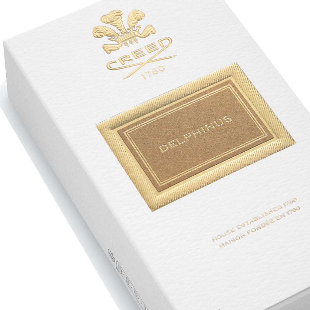 Elegant white and gold Creed Delphinus Eau de Parfum 100 ml box showcasing refined craftsmanship and timeless Creed branding, emphasizing its luxurious amber-vanilla character.
