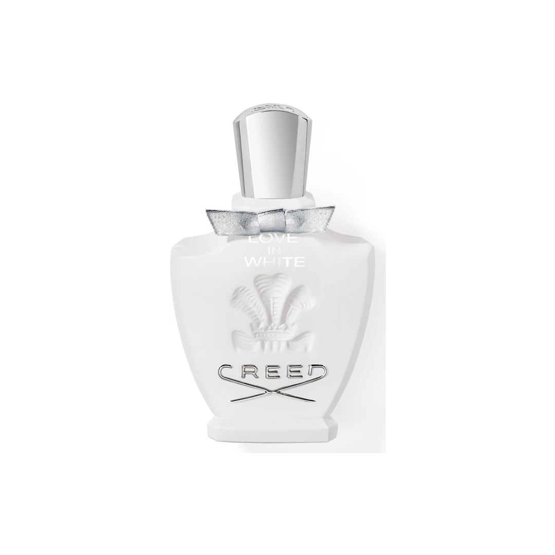 Luxurious Creed Love in White Eau de Parfum 75 ml bottle in pure white design, symbolizing elegance and freedom. This luminous fragrance blends orange zest, jasmine, magnolia, and rose with sandalwood and vanilla, creating a refined floral-fresh scent for sophisticated women.