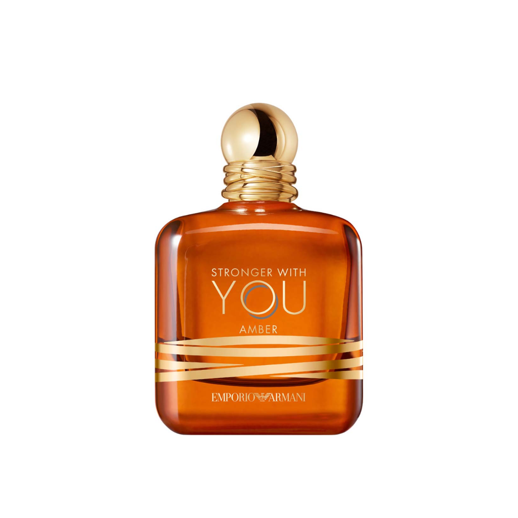 Close-up of Emporio Armani Stronger With You Amber Eau de Parfum 100 ml, showing its radiant amber glass bottle with gold accents. Captured for Fragrance Emporium, symbolizing warmth, confidence, and modern masculinity through notes of lavender, amber, and bourbon vanilla.