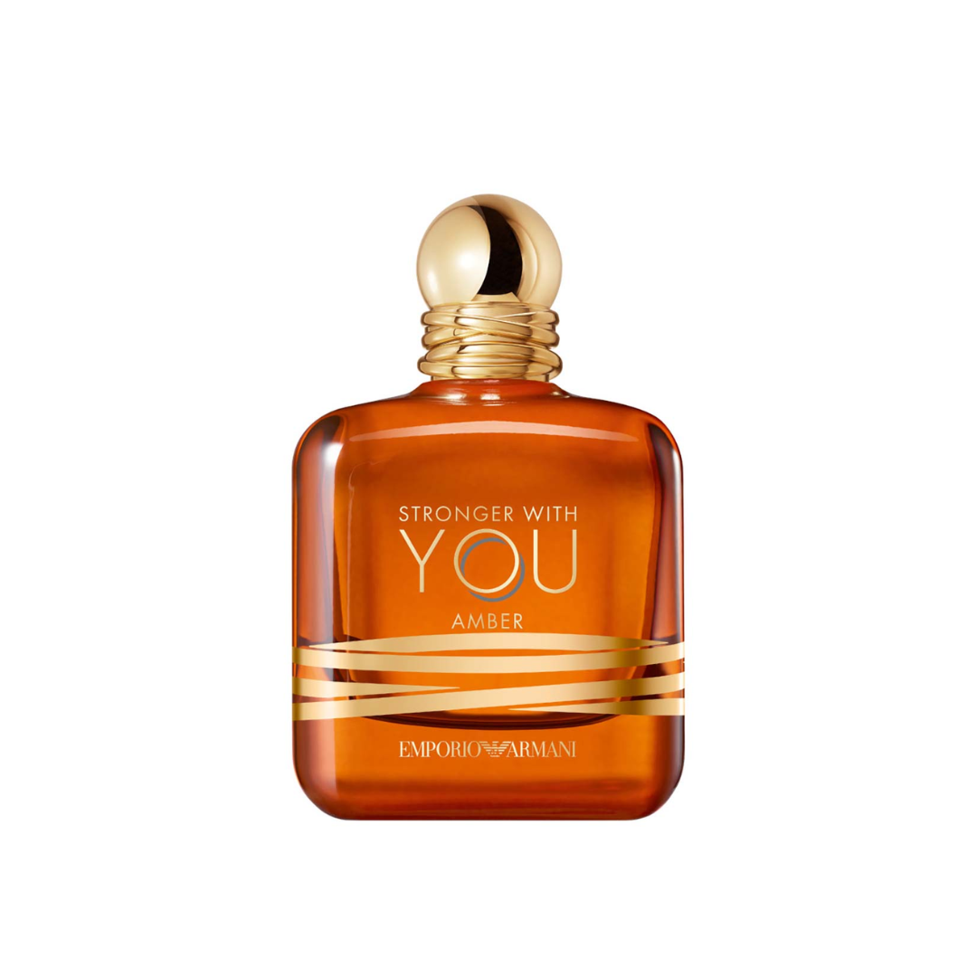 Close-up of Emporio Armani Stronger With You Amber Eau de Parfum 100 ml, showing its radiant amber glass bottle with gold accents. Captured for Fragrance Emporium, symbolizing warmth, confidence, and modern masculinity through notes of lavender, amber, and bourbon vanilla.