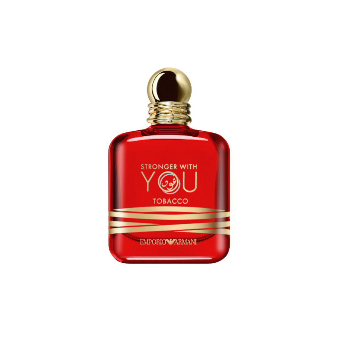 Close-up of Emporio Armani Stronger With You Tobacco Eau de Parfum 100 ml in its striking red and gold bottle. The image captures the fragrance’s luxurious and bold character, symbolizing the warmth of tobacco, bourbon vanilla, and spicy pepper notes that define this amber scent for men.