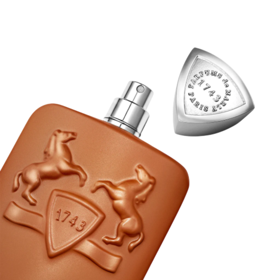 Fragrance Emporium – Parfums de Marly Althair Eau de Parfum, brown bottle photographed at an angle with cap off. Premium unisex fragrance showcasing vanilla and amber notes.