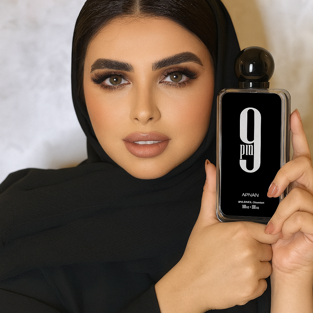 Elegant model holding Midnight Code Eau de Parfum by Fragrance Emporium – luxurious masculine fragrance for nighttime sophistication.

