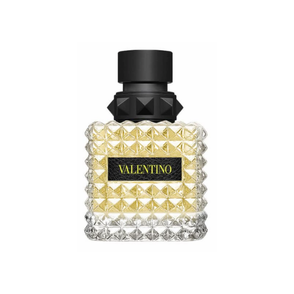 Fragrance Emporium – Valentino Donna Born in Roma Yellow Dream Eau de Parfum, elegant studded glass bottle with yellow juice. A radiant women’s fragrance with lemon, rose, and musk.