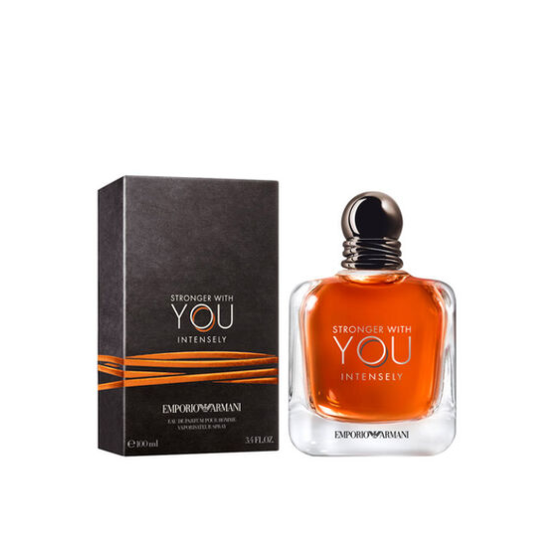 Giorgio Armani Stronger With You Intensely Eau de Parfum 100ml bottle beside its original packaging. Captured for Fragrance Emporium, featuring a luxurious amber glass and warm fougère blend of pink pepper, cinnamon, vanilla, and tonka bean for modern masculine allure.
