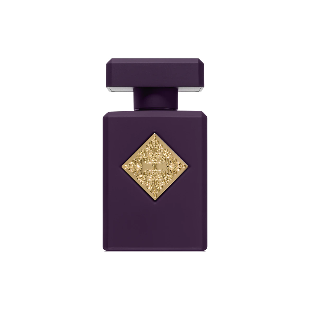 Initio Side Effect EDP 90 ml perfume bottle in deep purple with a golden label. A luxurious unisex amber fragrance blending rum, tobacco, cinnamon, and vanilla. Available at Fragrance Emporium.

