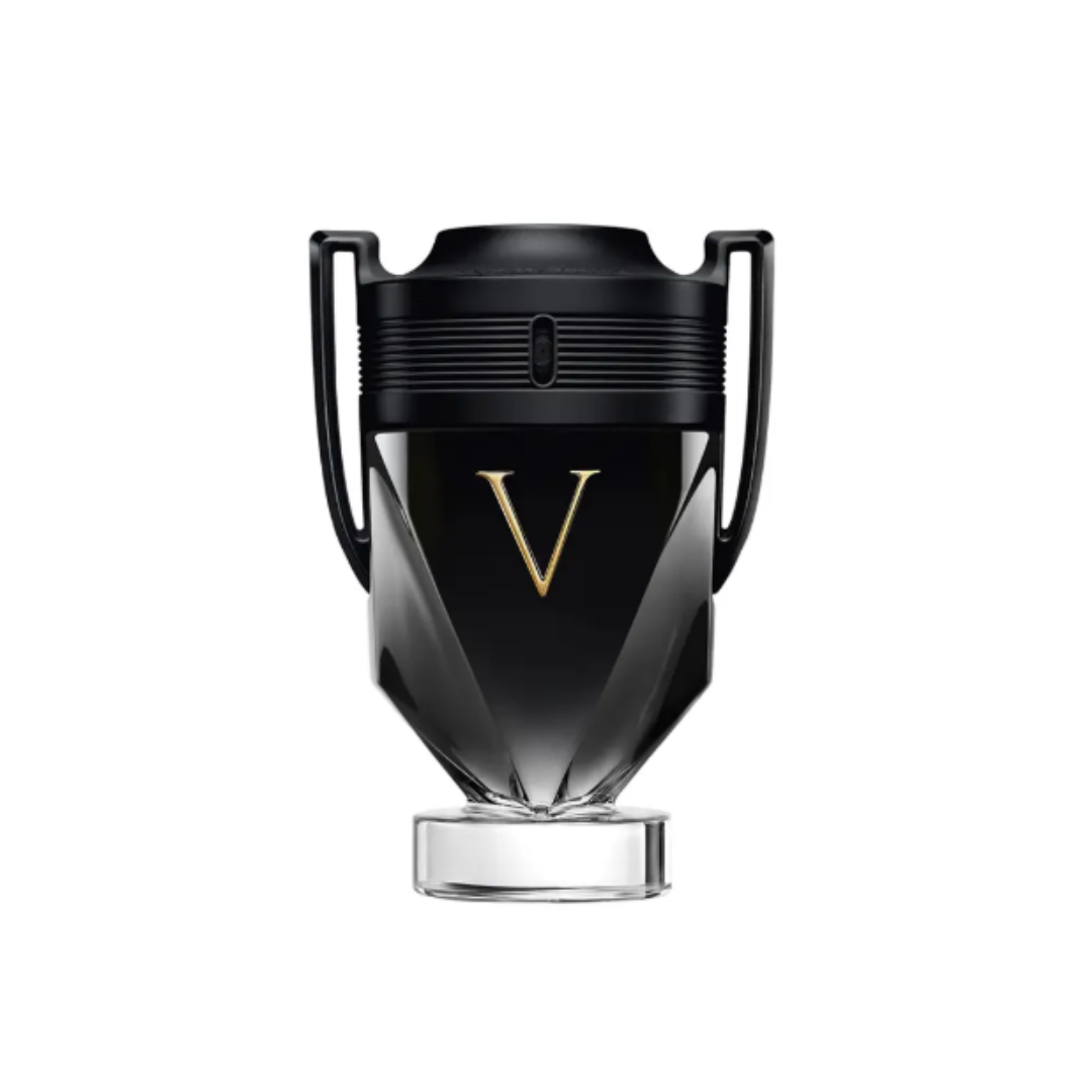 Close-up of the Invictus Victory by Paco Rabanne Eau de Parfum 100 ml, featuring its iconic black trophy-shaped bottle with golden “V” detail. The image showcases the fragrance’s bold design and symbolizes victory, power, and masculine sophistication, perfectly reflecting its amber vanilla notes of tonka bean, lemon, and pink pepper.