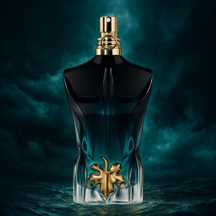 Jean Paul Gaultier Le Beau Le Parfum Eau de Parfum photographed against a deep aquatic background, highlighting its fresh, exotic, and intense masculine scent.