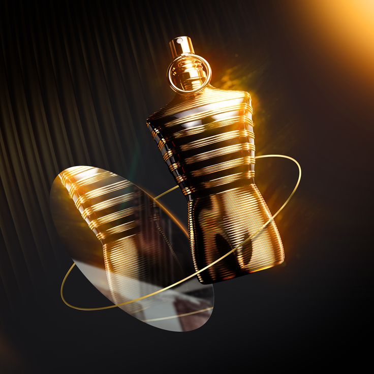 Jean Paul Gaultier Le Male Elixir Eau de Parfum photographed with a fiery red and gold background, symbolizing the intensity, warmth, and seductive power of the scent.