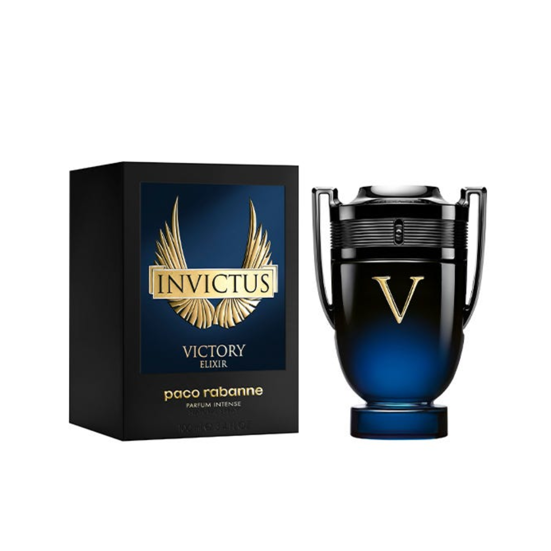 Paco Rabanne Invictus Victory Elixir EDP 100 ml perfume with elegant black and gold box beside the blue trophy-style bottle. A rich amber-woody fragrance blending lavandin, cardamom, incense, and vanilla bean. Premium authentic scent for men from Fragrance Emporium.