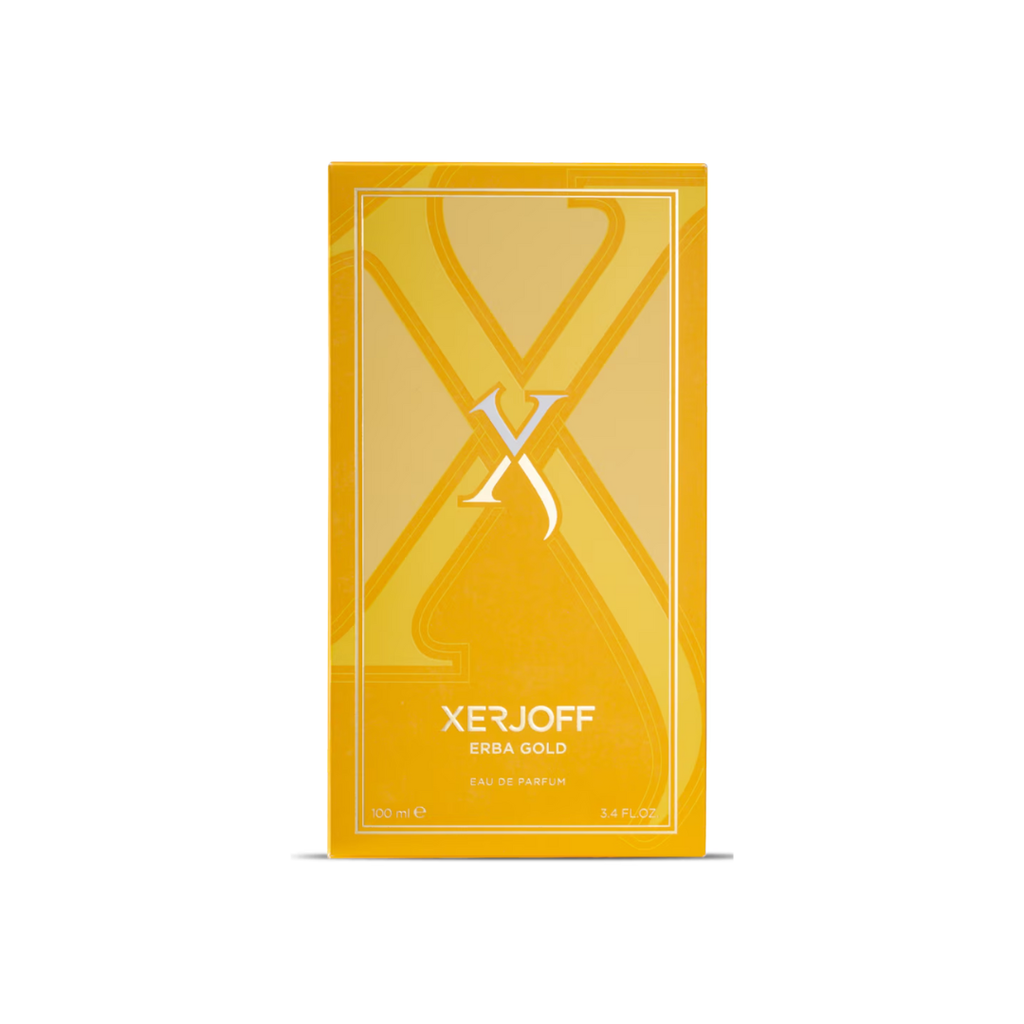 Luxurious presentation of Xerjoff Erba Gold Eau de Parfum 100 ml beside its elegant golden box. The image highlights the sophisticated craftsmanship and the perfume’s sunny blend of citrus, spicy, and creamy vanilla notes, symbolizing Italian artistry and timeless unisex appeal.