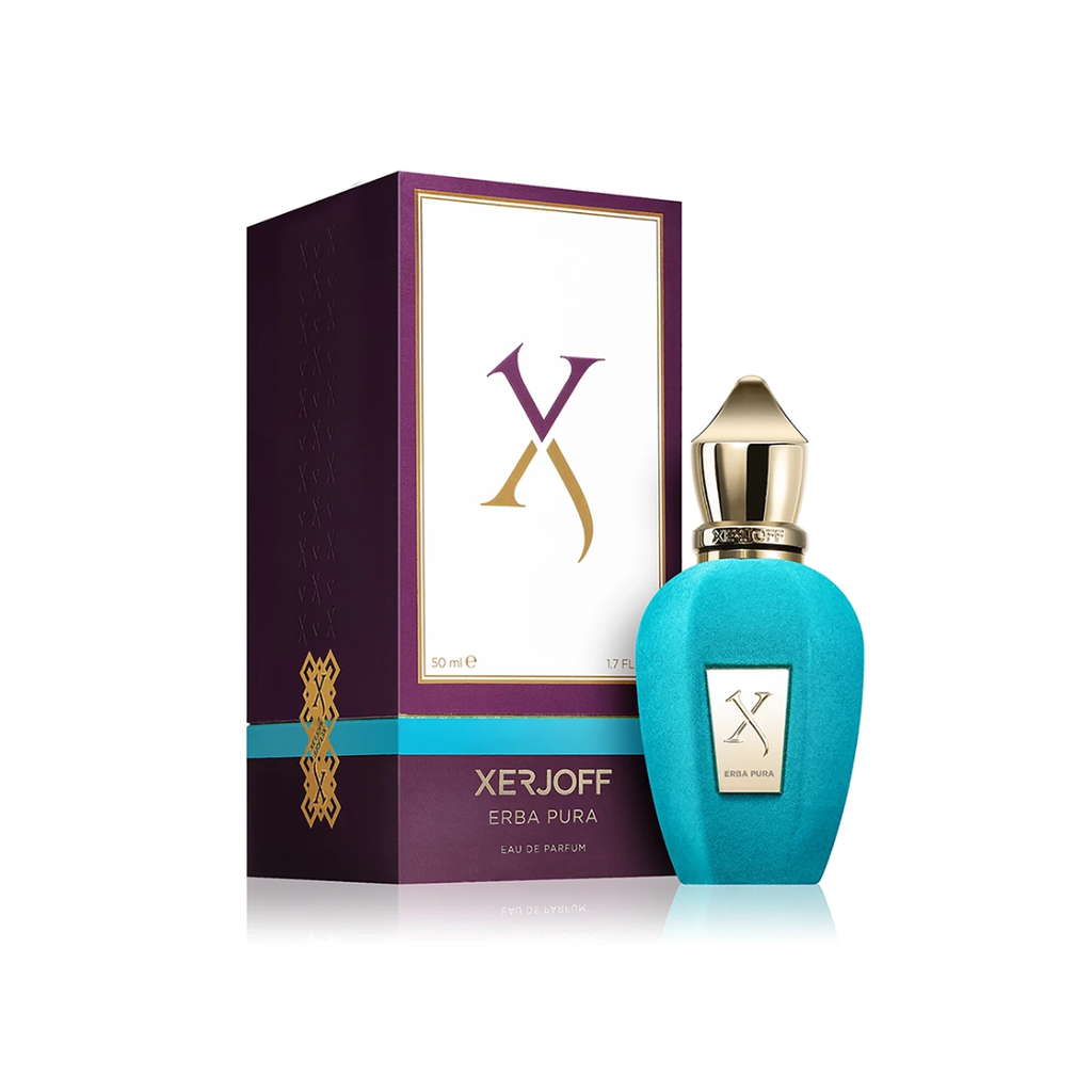 Elegant display of Xerjoff Erba Pura Eau de Parfum 100 ml with its signature purple box. The photo highlights the fragrance’s refined presentation and the radiant, long-lasting citrus blend of Sicilian orange, Calabrian bergamot, and amber — symbolizing Italian luxury and timeless freshness.