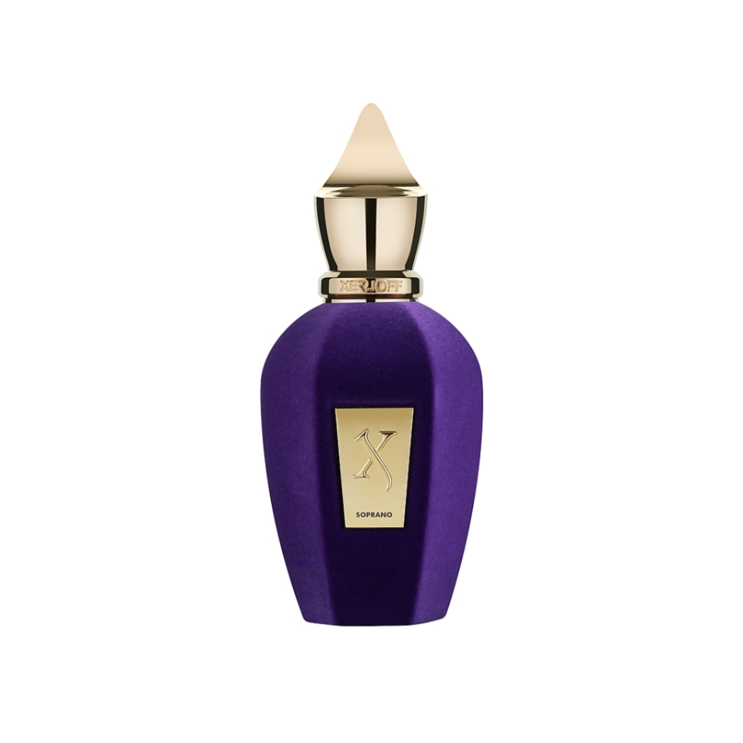 Close-up of Xerjoff Soprano Eau de Parfum 100 ml in its deep purple bottle with gold accents and elegant cap. The image highlights the fragrance’s sophisticated design and oriental floral character, featuring rich notes of rose, jasmine, oud, patchouli, and musk that express power, luxury, and timeless elegance.
